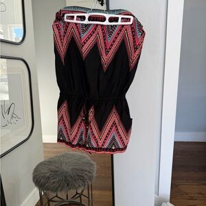 Brand New with tags, strapless, shorts jumpsuit, size medium